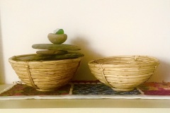 Two bowls, one with stones
